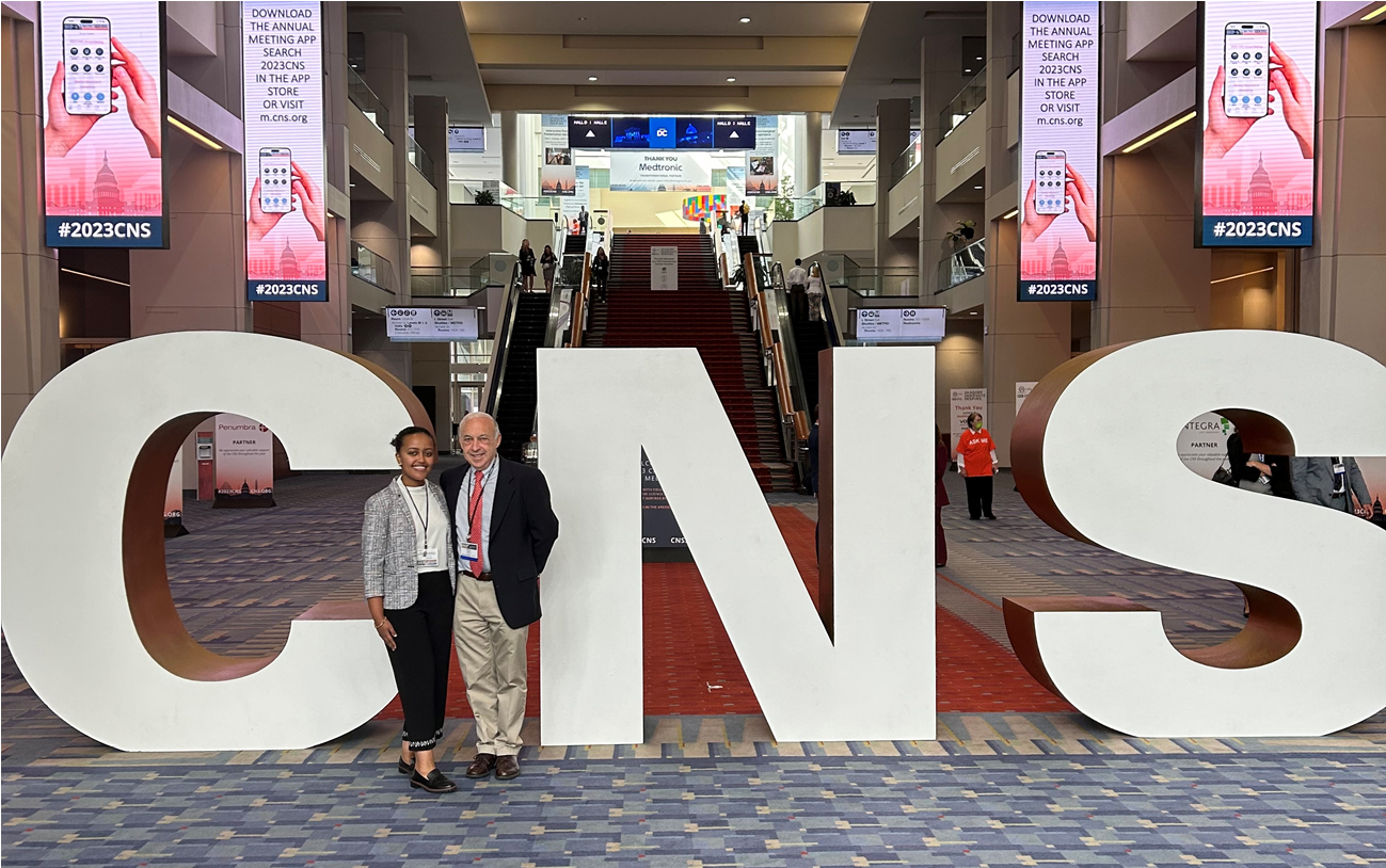 Dr. Reisner and Makda Mulugeta at the 2023 Congress of Neurological Surgeons Annual Meeting presenti