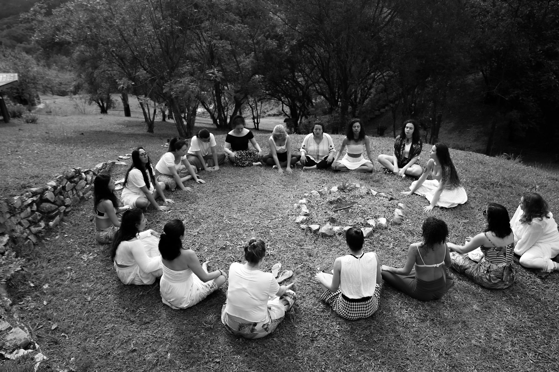 women sitting in circle
