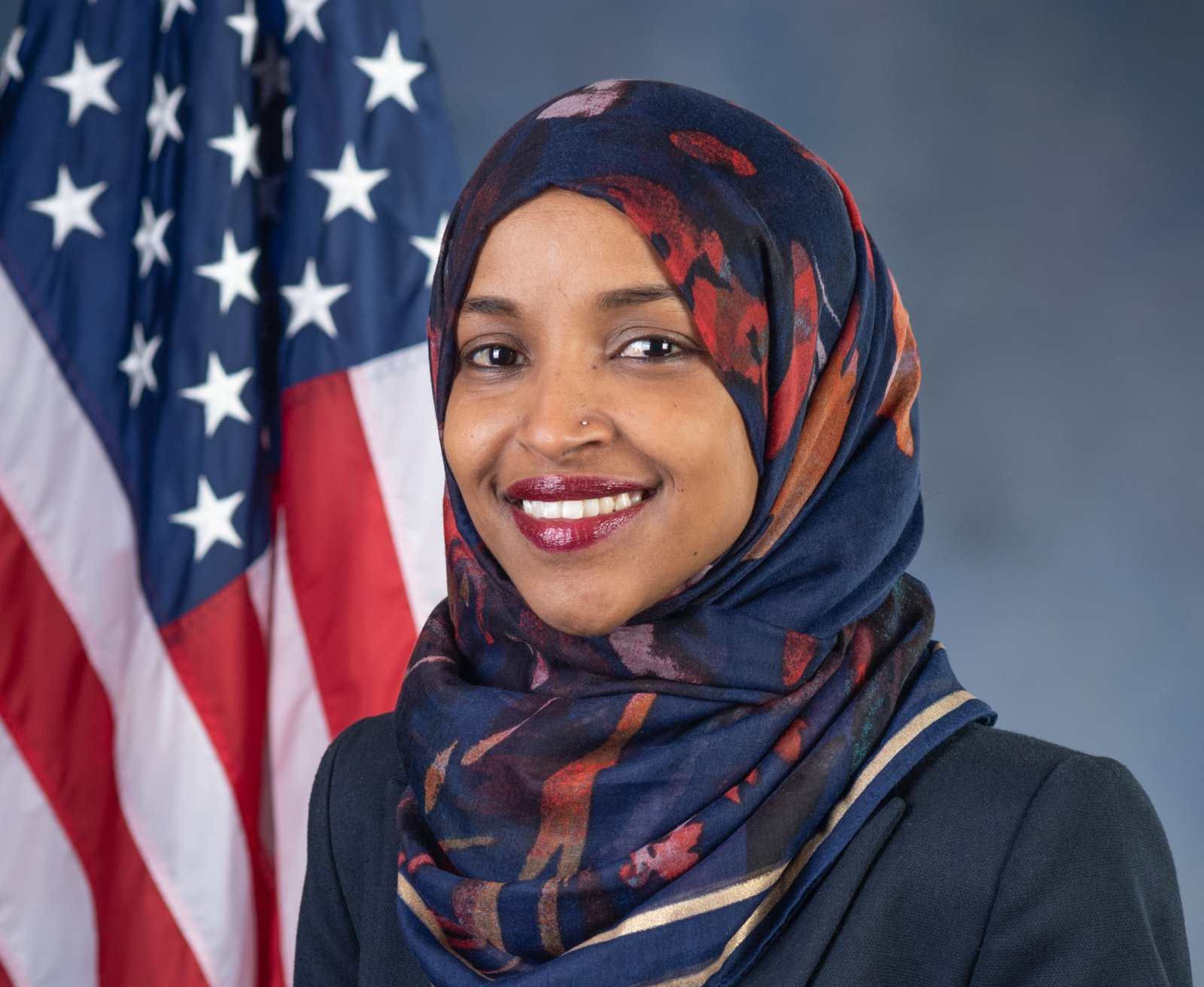 Ilhan Omar photo portrait in front of American Flag