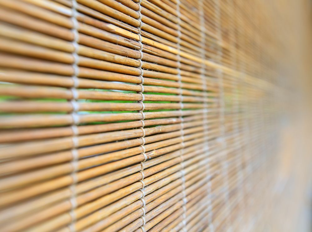 Wooden blinds covering a window.