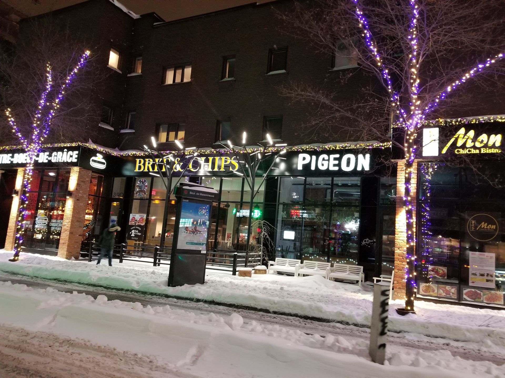 A building with a sign that says pigeon on it