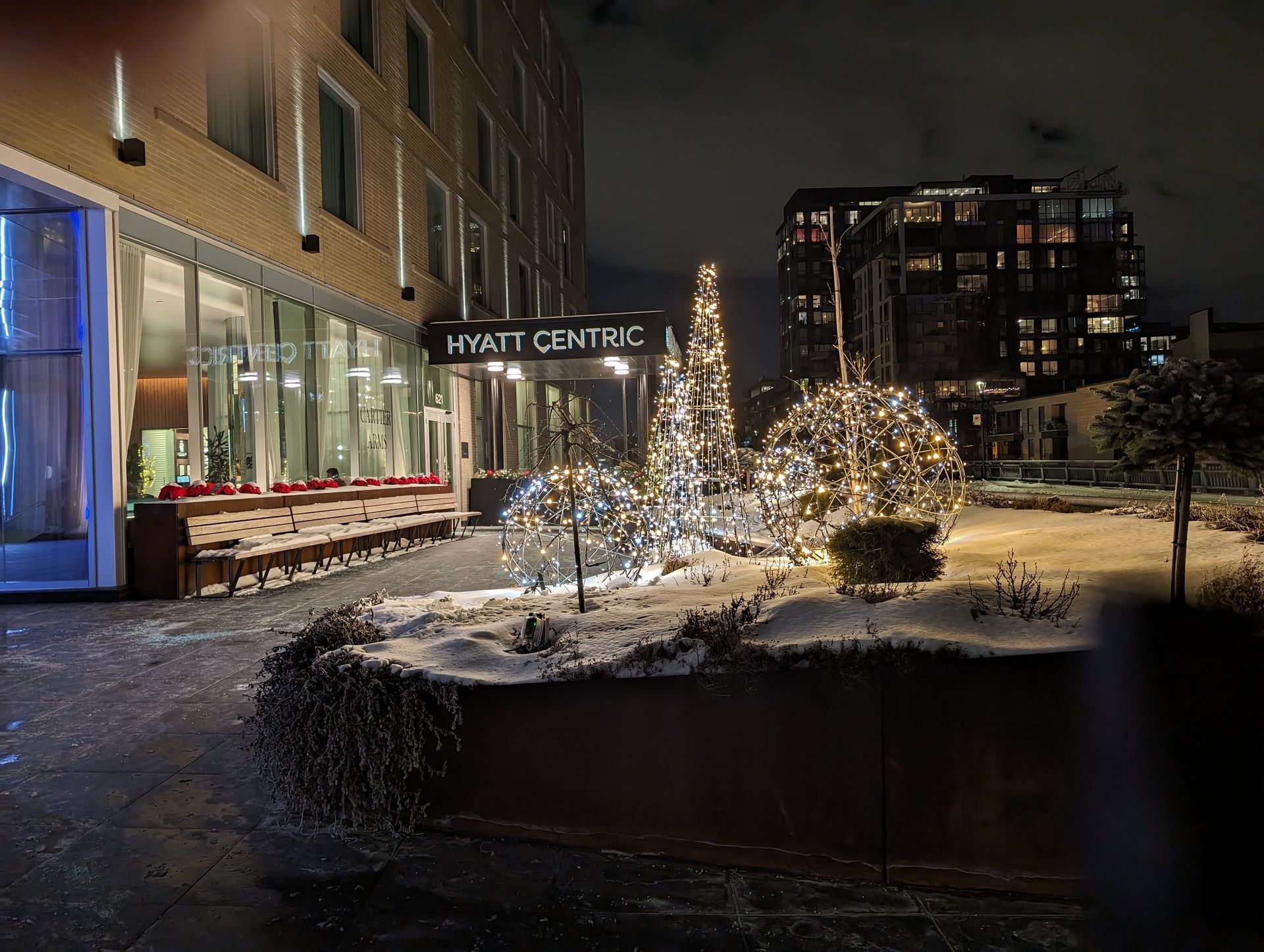 A large building with a sign that says hyatt centre