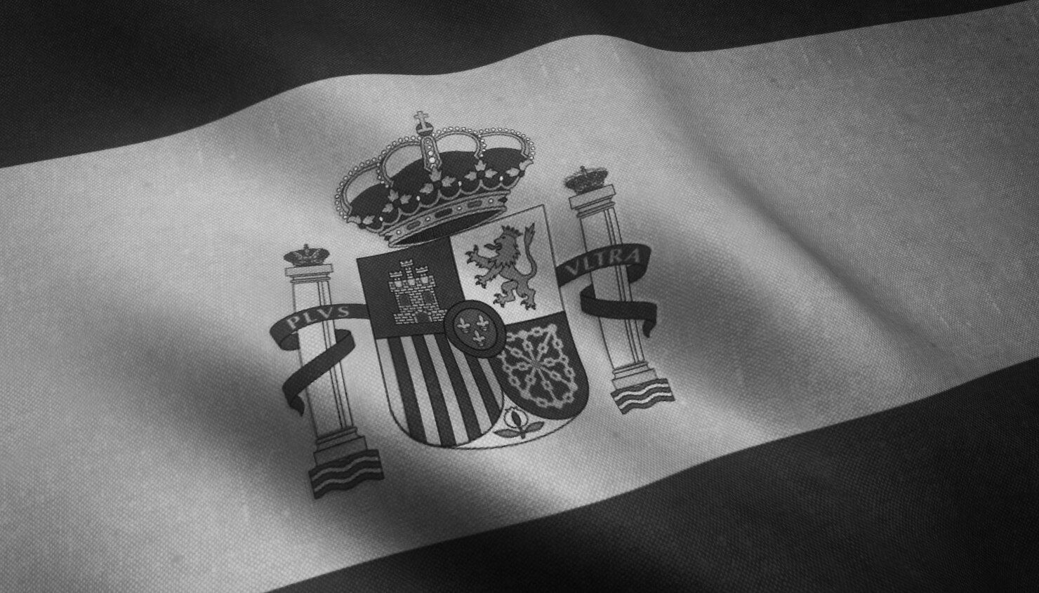 Una foto en blanco y negro de una bandera española