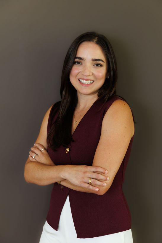 Daniela de Zamacona, Realtor, brown hair, smiling