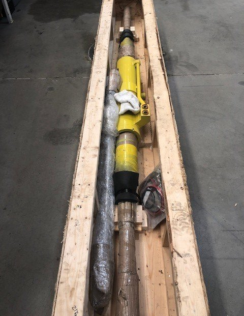 Worker Doing Maintenance On Machine — Salt Lake City, UT — Wolfe Mining Products