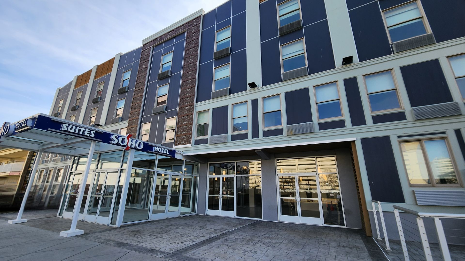 A large building with a lot of windows and doors