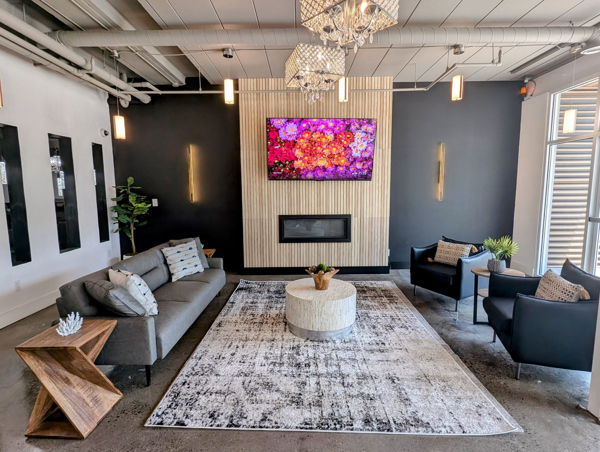 Lobby area seating with TV and fire place