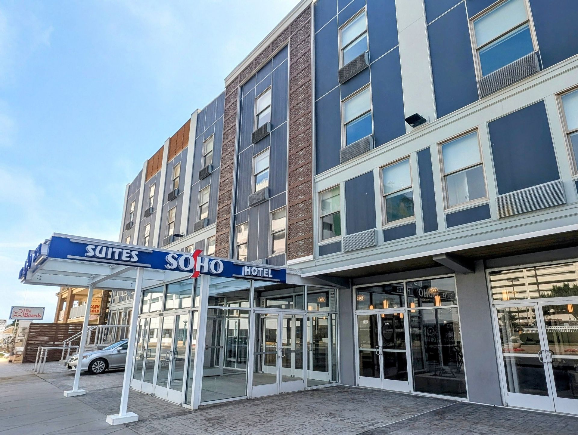 A large building with a lot of windows and doors