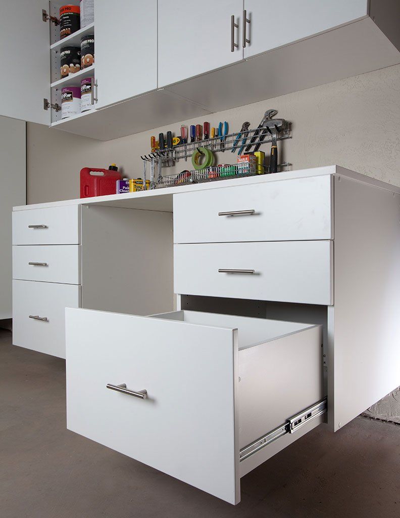 White custom built garage cabinets