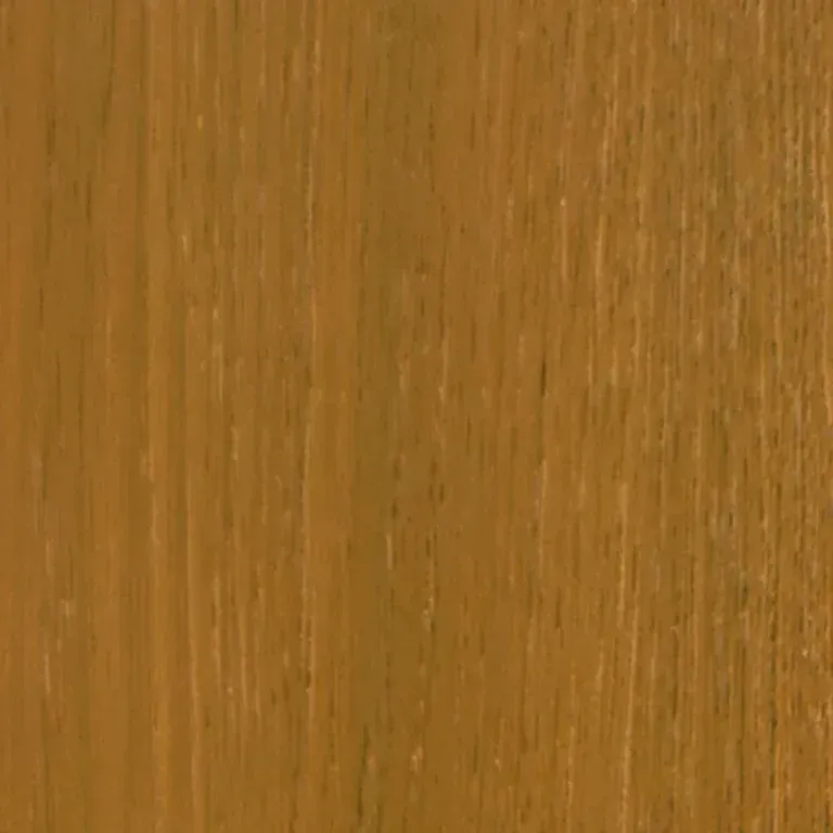 Un primo piano di un pezzo di legno che ne mostra la venatura e la consistenza.