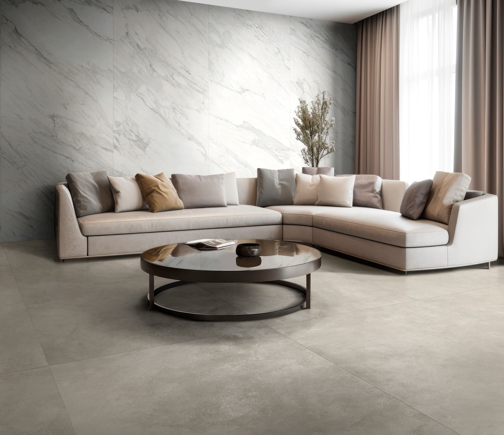 Un soggiorno con un grande divano componibile e un tavolino rotondo.