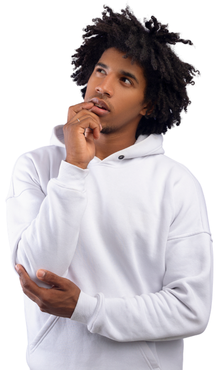 Man in white hoodie, looking up thoughtfully, hand near mouth.