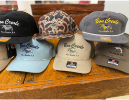 Several trucker hats with 