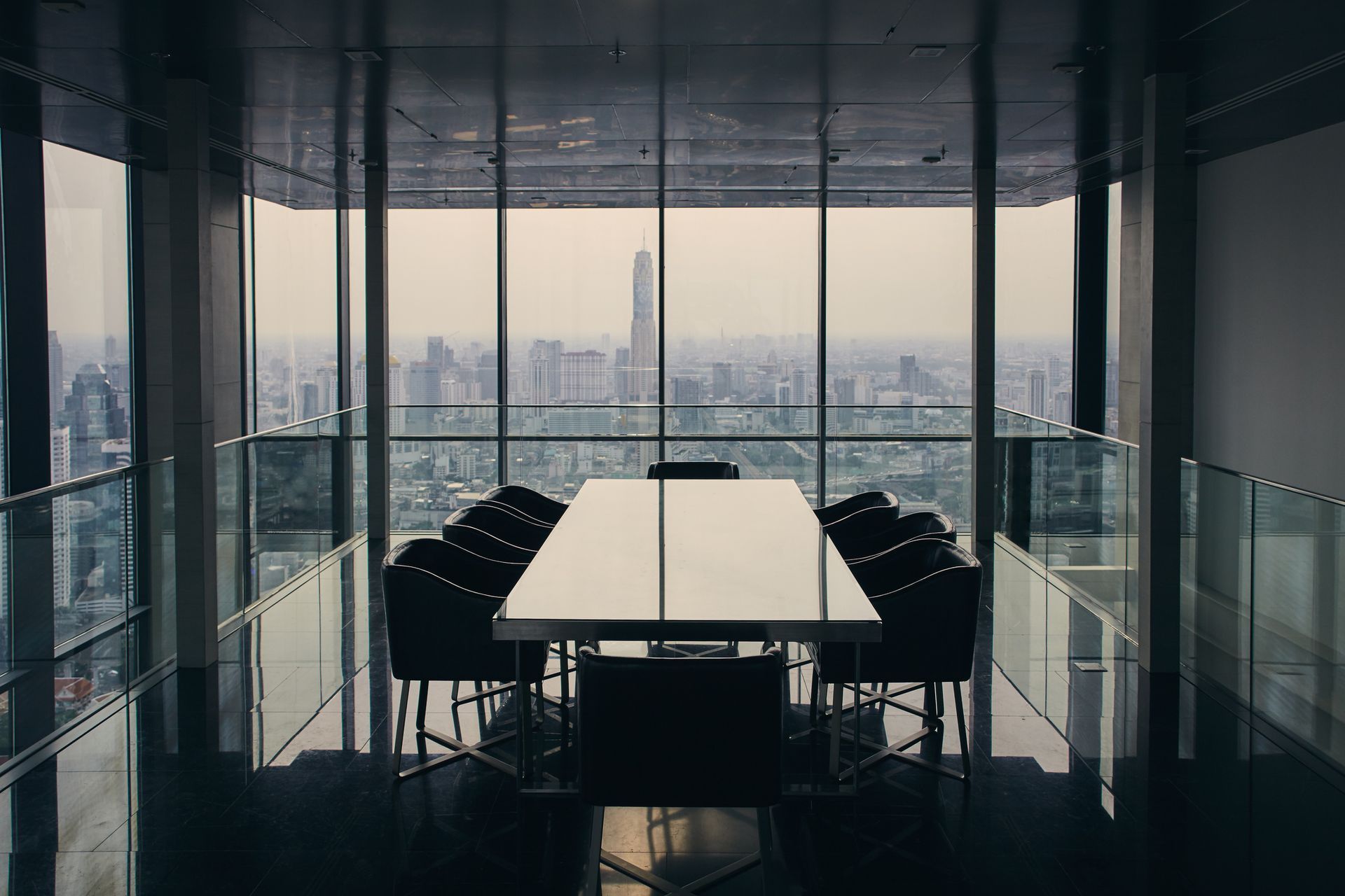 A conference room with a view of the city