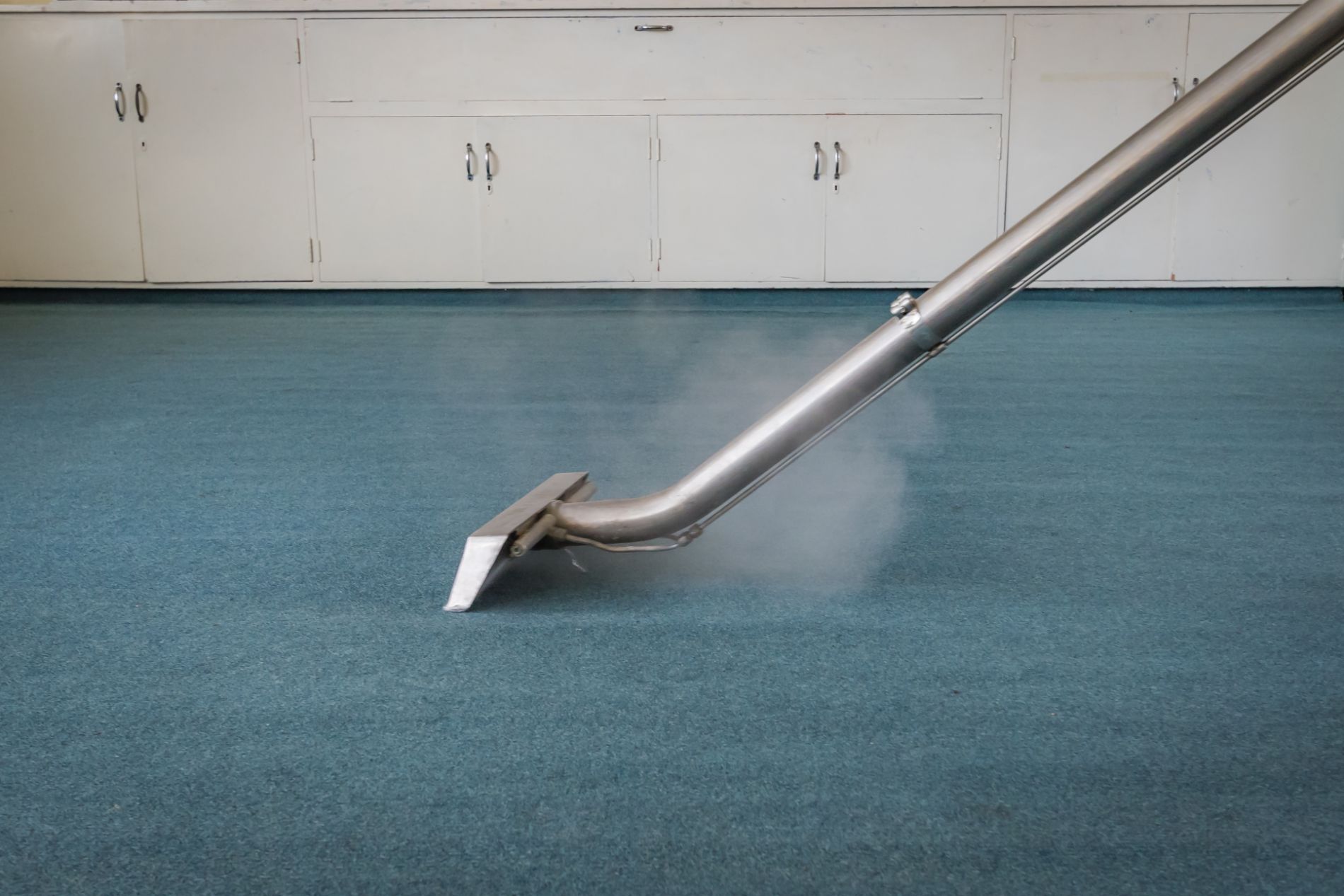 Steam cleaning carpet