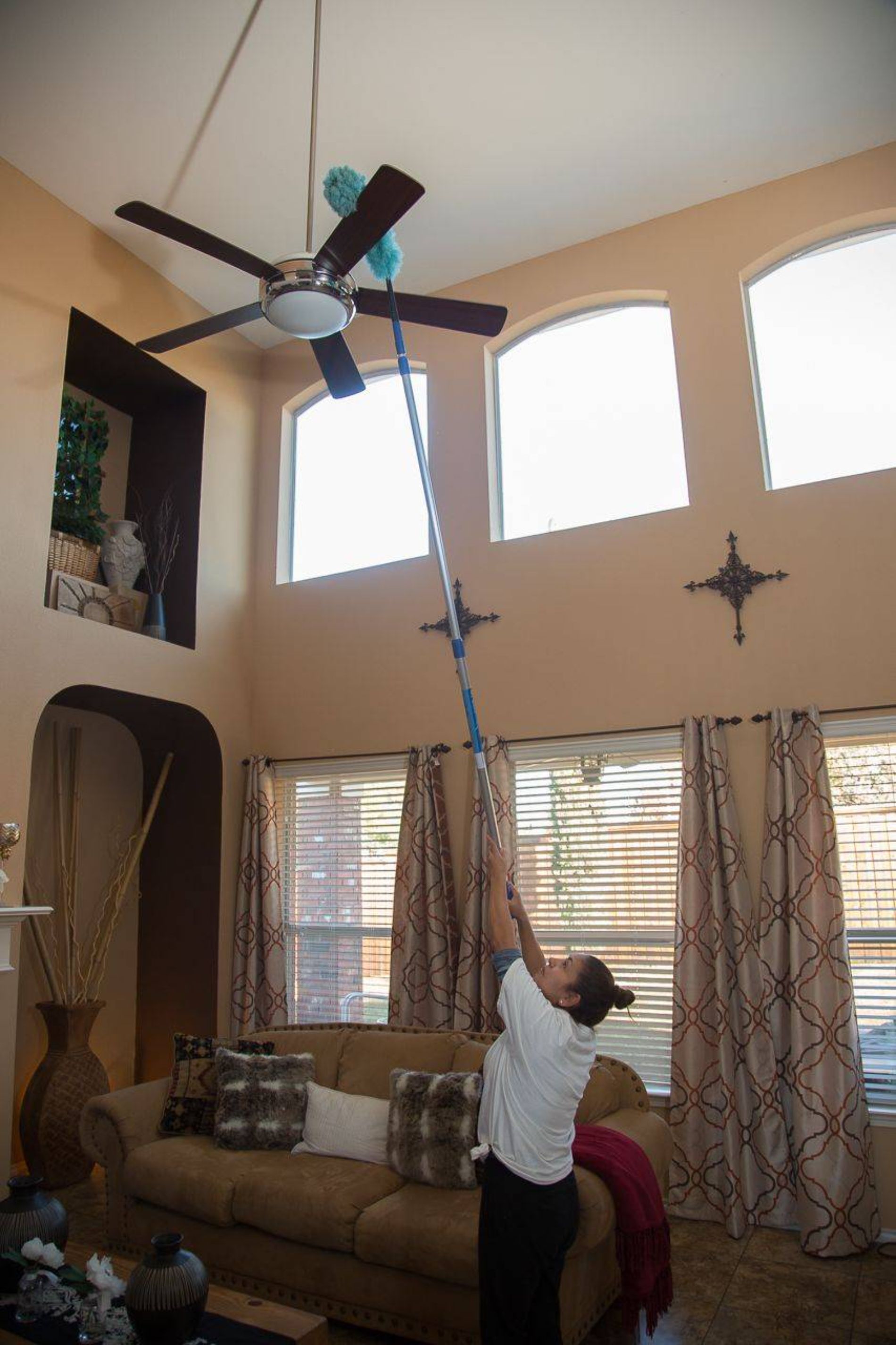 Dusting a ceiling fan