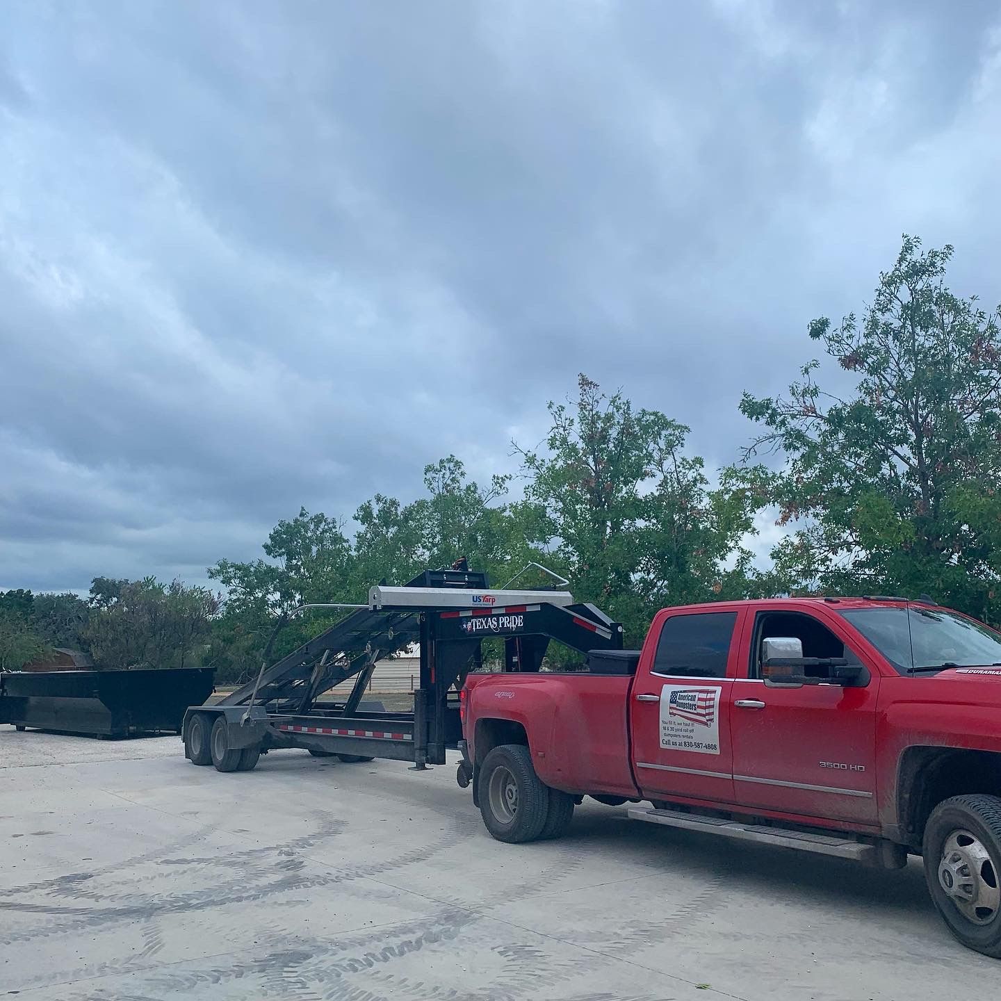 Photo of American Dumpsters Roll-Off Dumpster and truck