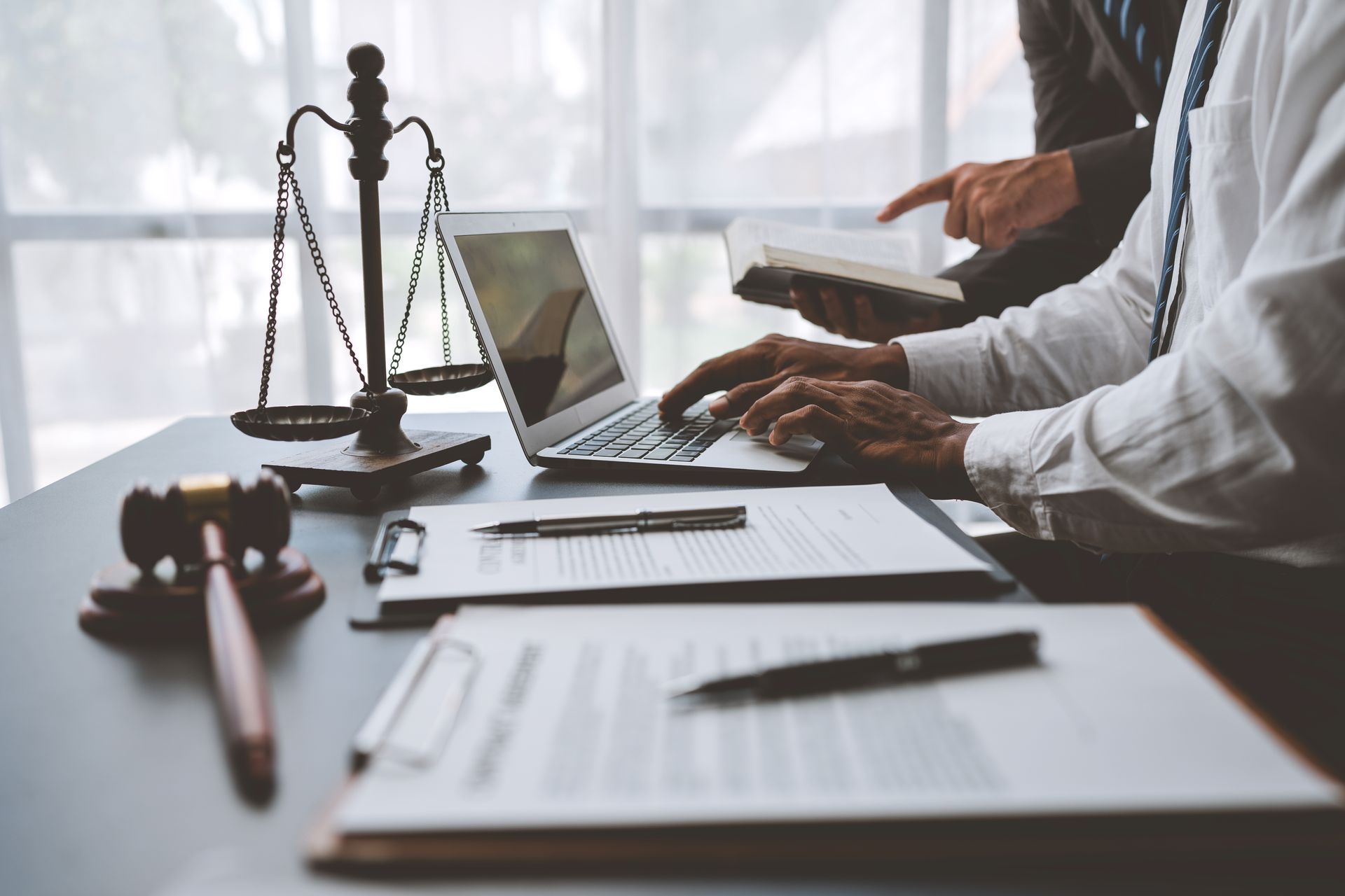Lawyers working together to prepare legal strategy. Ledbetter Anderson & Associates Law Firm, Houston TX, Estate Planning and Probate Lawyer