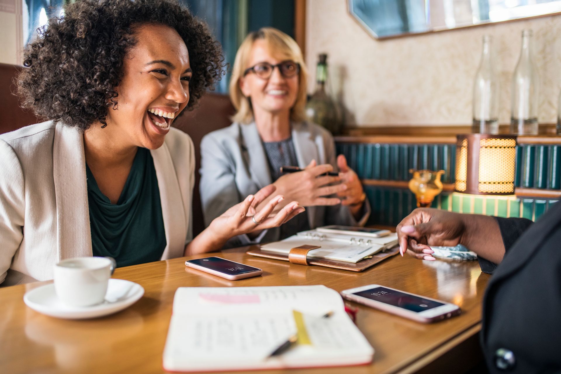 A man and woman are sitting on a couch talking to a man in a suit. Ledbetter Anderson & Associates Law Firm, Houston TX, Estate Planning and Probate