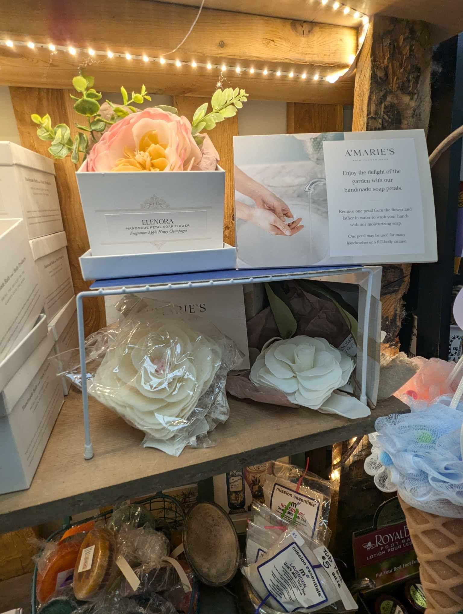 A Shelf Filled with Lots of Flowers and Candles — Summerville, SC — Donovan's Custom Framing and Gifts