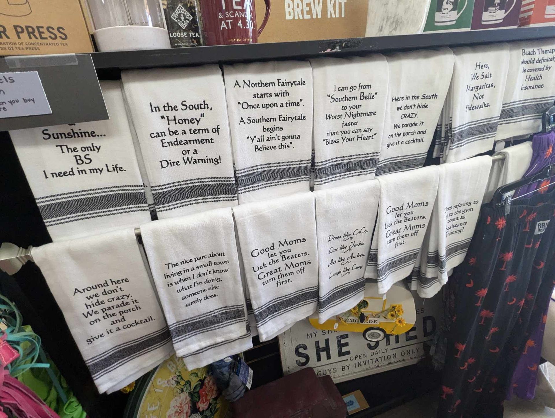 A Row of Towels Hanging on a Shelf in a Store — Summerville, SC — Donovan's Custom Framing and Gifts