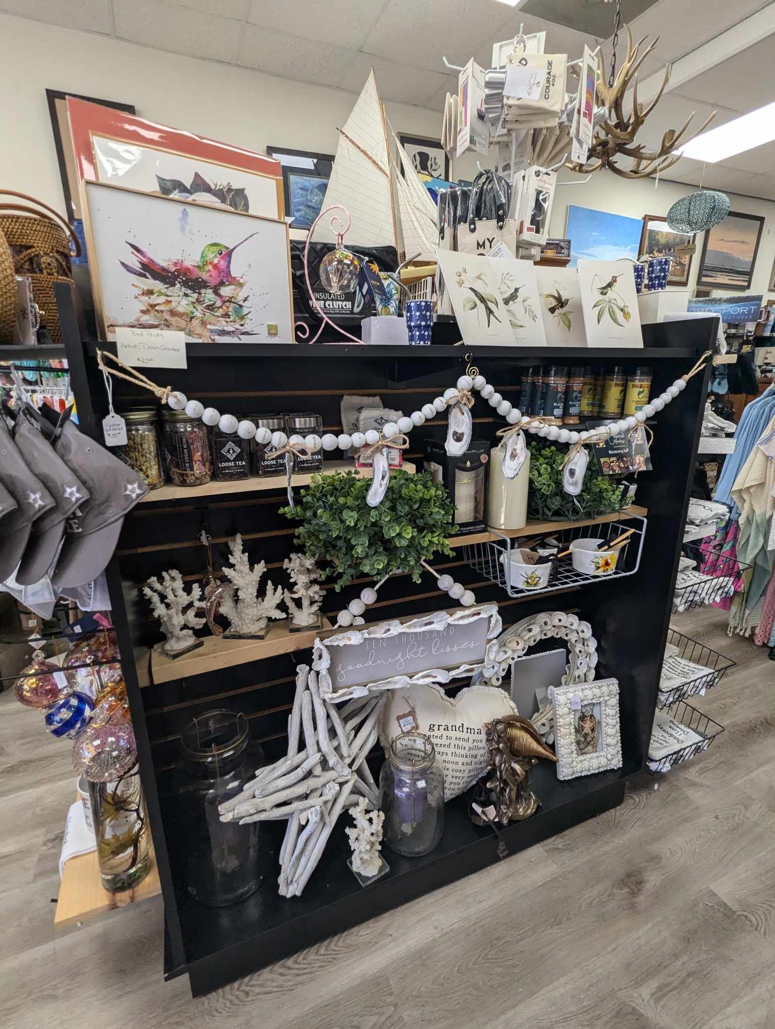 A Shelf Filled with Lots of Decorations and Candles in a Store — Summerville, SC — Donovan's Custom Framing and Gifts