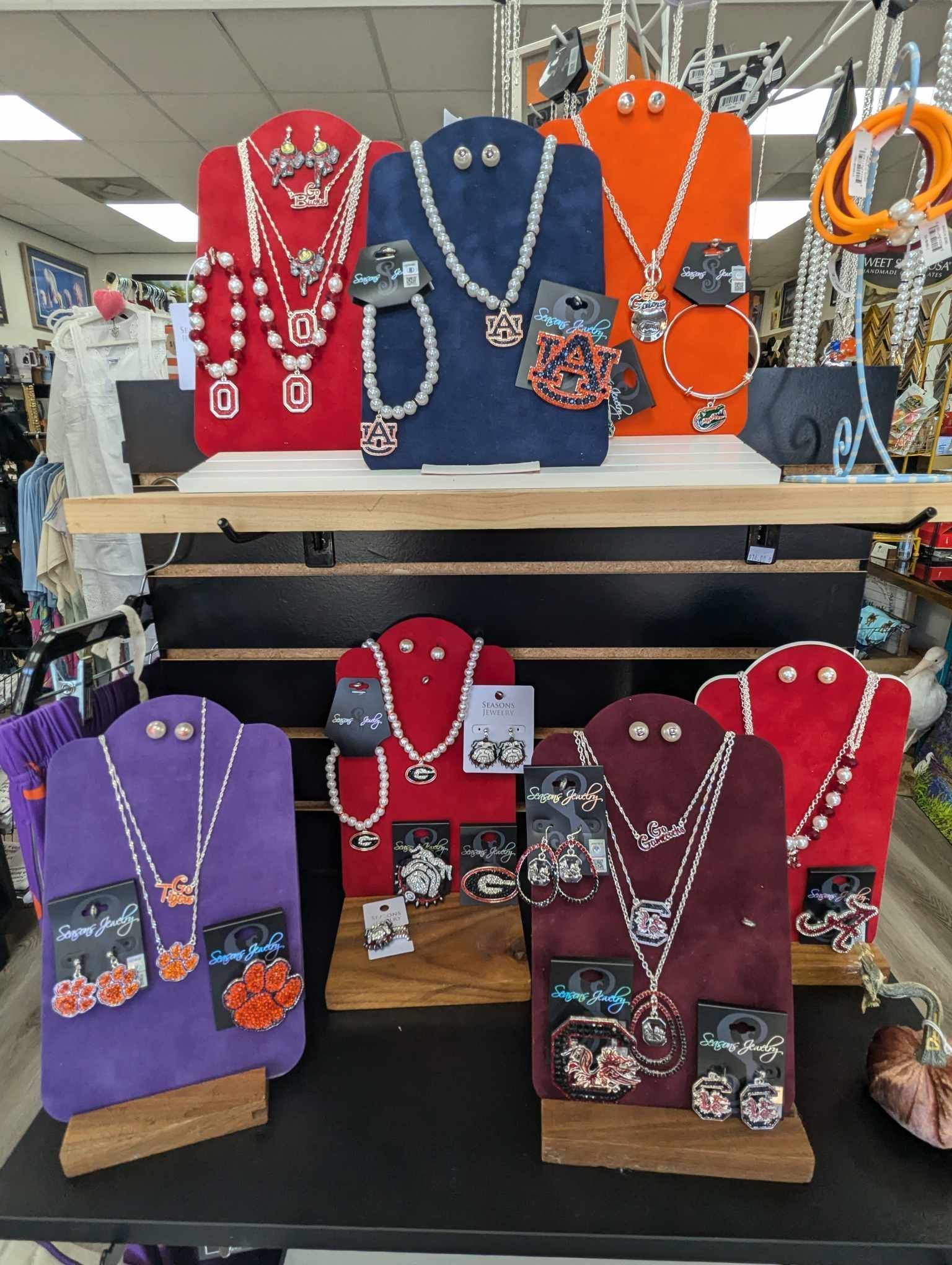 A Display of Necklaces and Earrings on Mannequins in a Store — Summerville, SC — Donovan's Custom Framing and Gifts