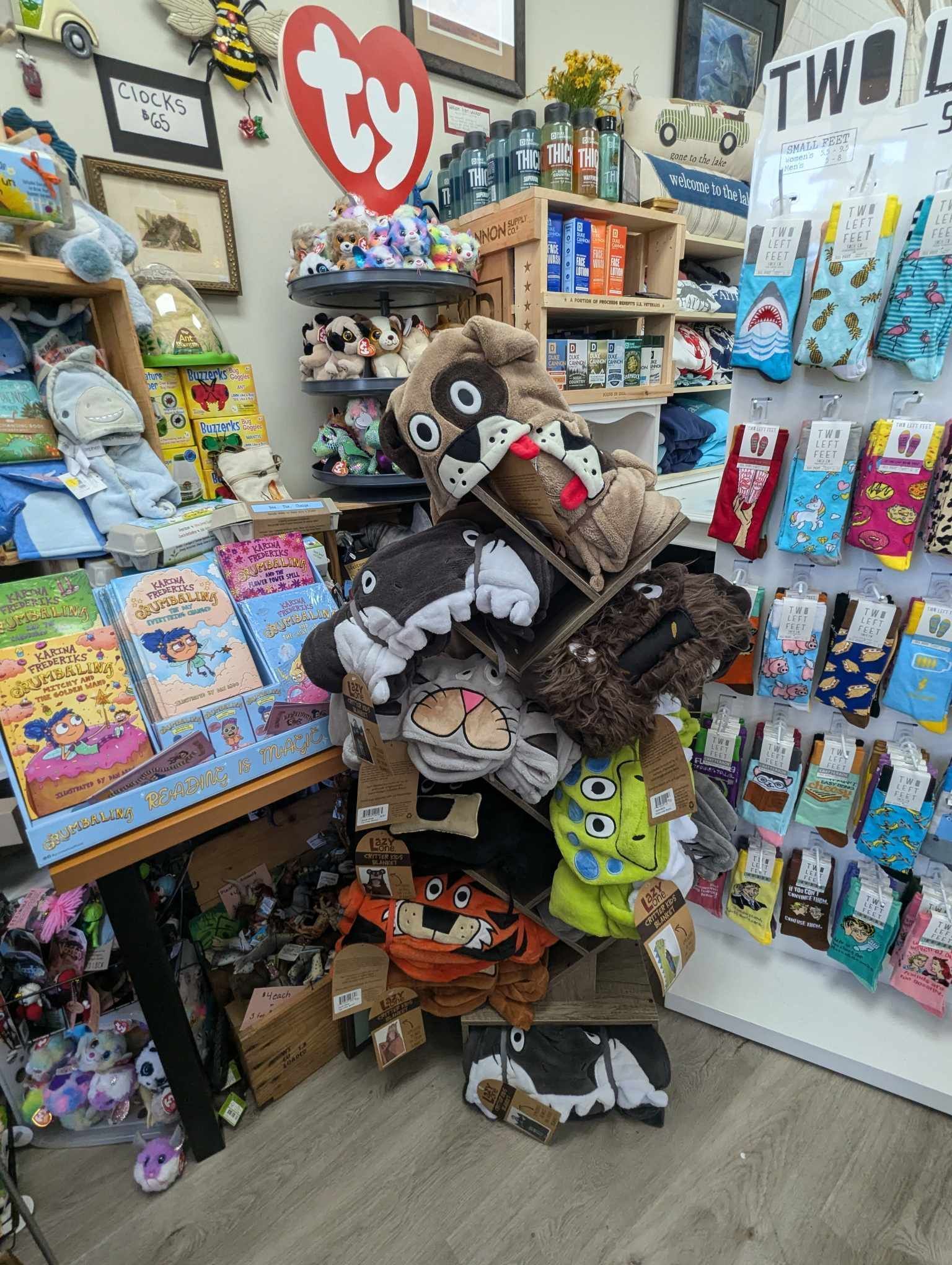 A Store Filled with Lots of Stuffed Animals and Socks — Summerville, SC — Donovan's Custom Framing and Gifts