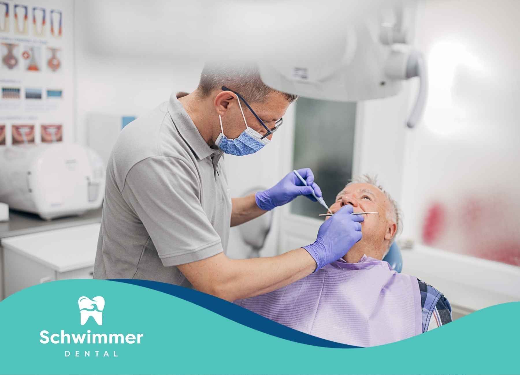 A dentist is examining a patient's teeth in a dental office.