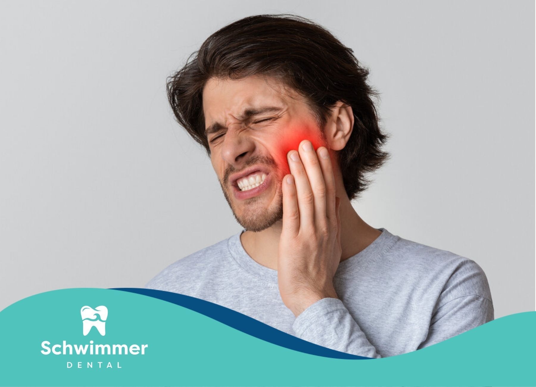Man wincing while touching his cheek, with redness indicating intense dental implant pain in NJ.