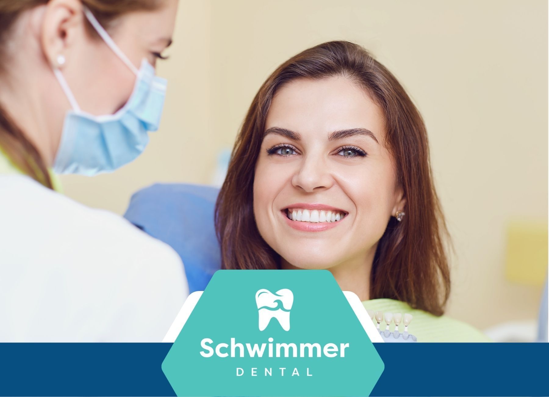 A woman is smiling while sitting in a dental chair at schwimmer dental