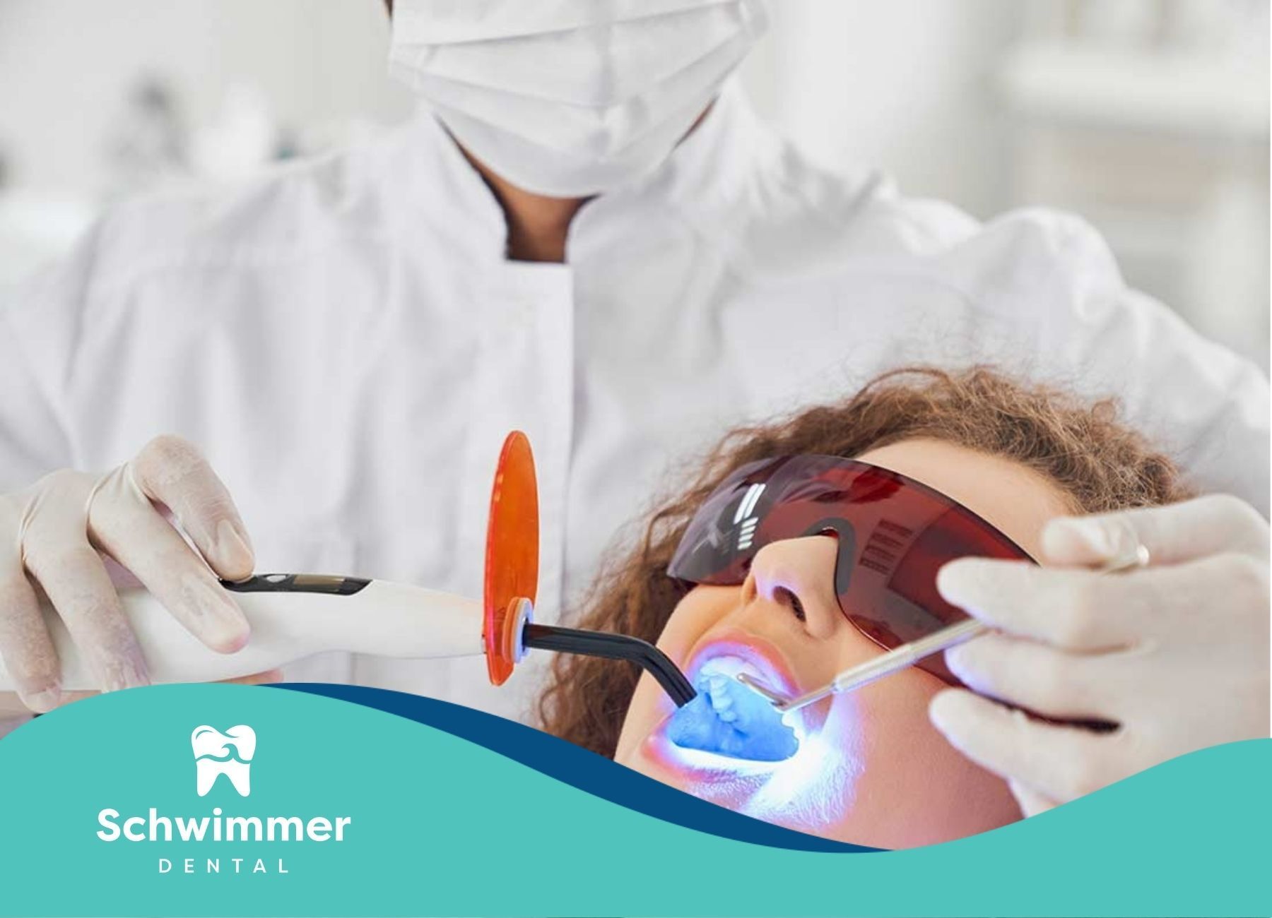 Dentist performing laser treatment on patient with protective glasses in Point Pleasant Beach, NJ.