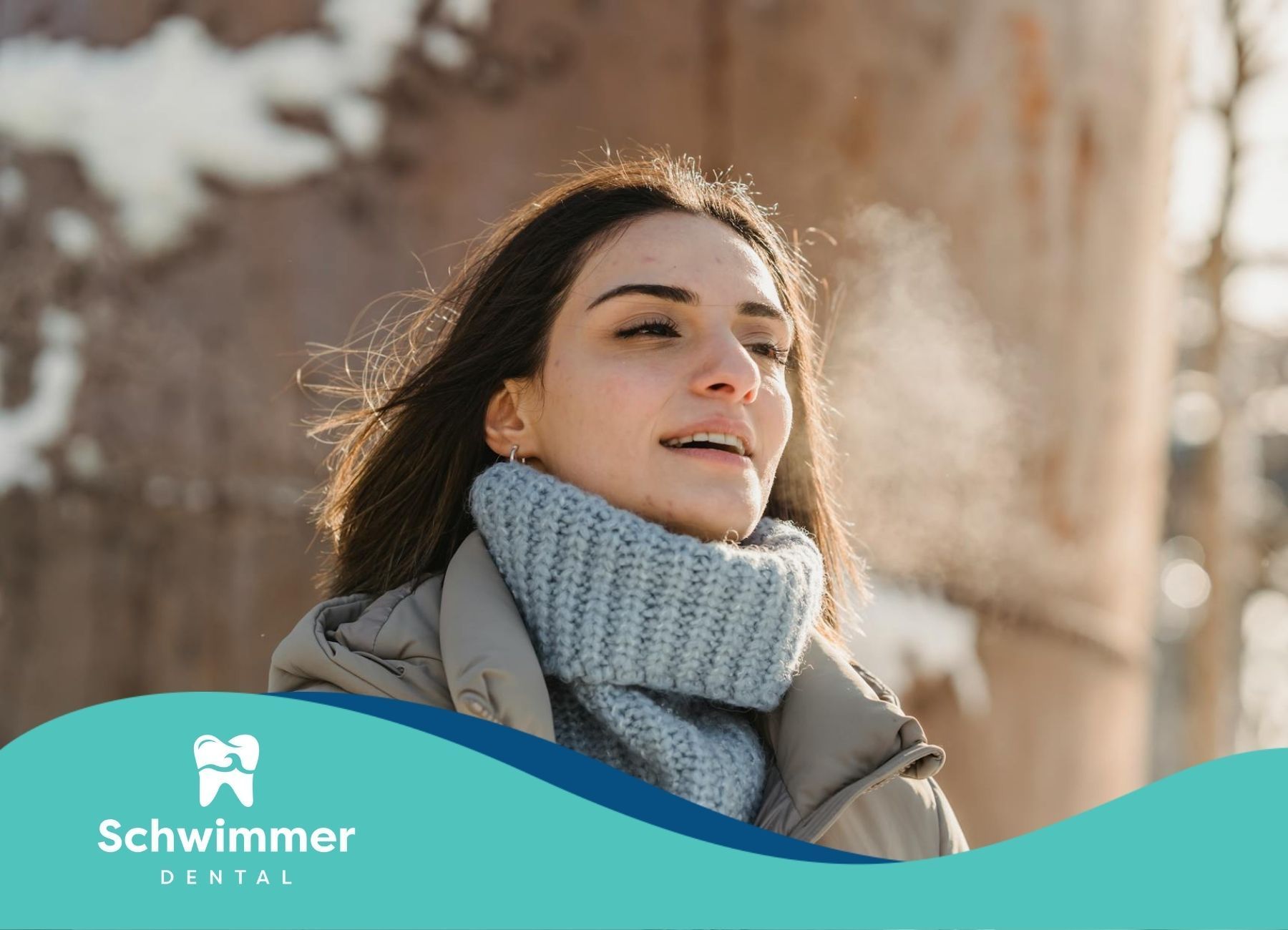 Woman breathing out visible air in cold weather after a dental visit in Point Pleasant Beach, NJ.