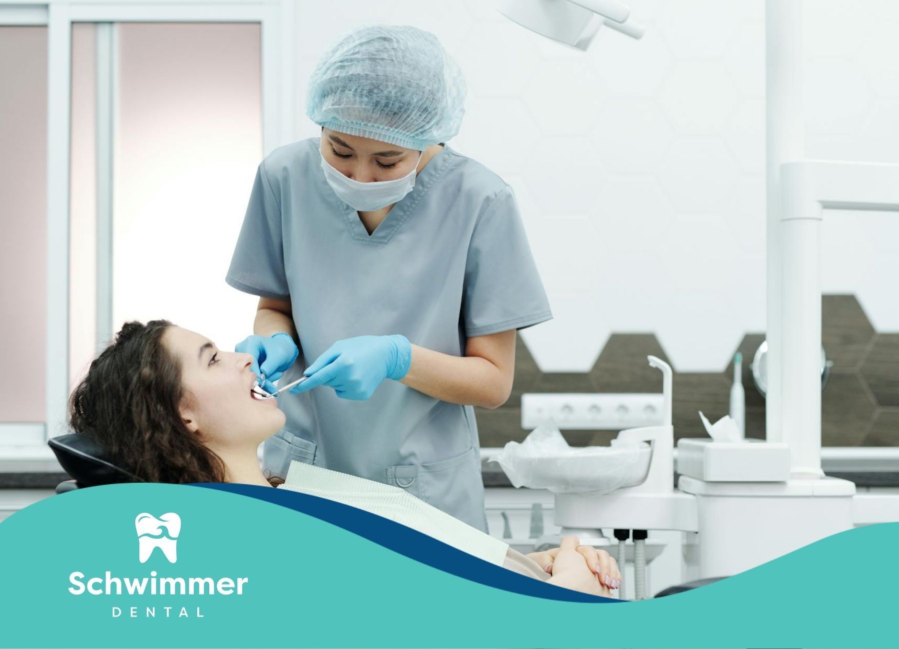 Dentist treating and extracting a tooth on a patient at a dental clinic in Lakewood, New Jersey.