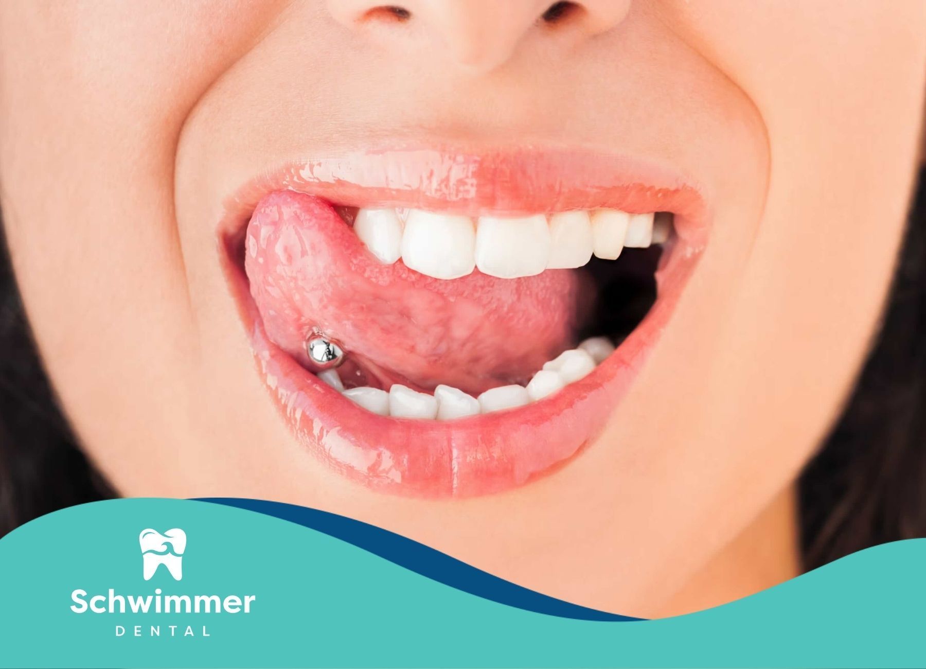 A pierced tongue and white teeth during a dental check-up in Point Pleasant Beach, New Jersey.