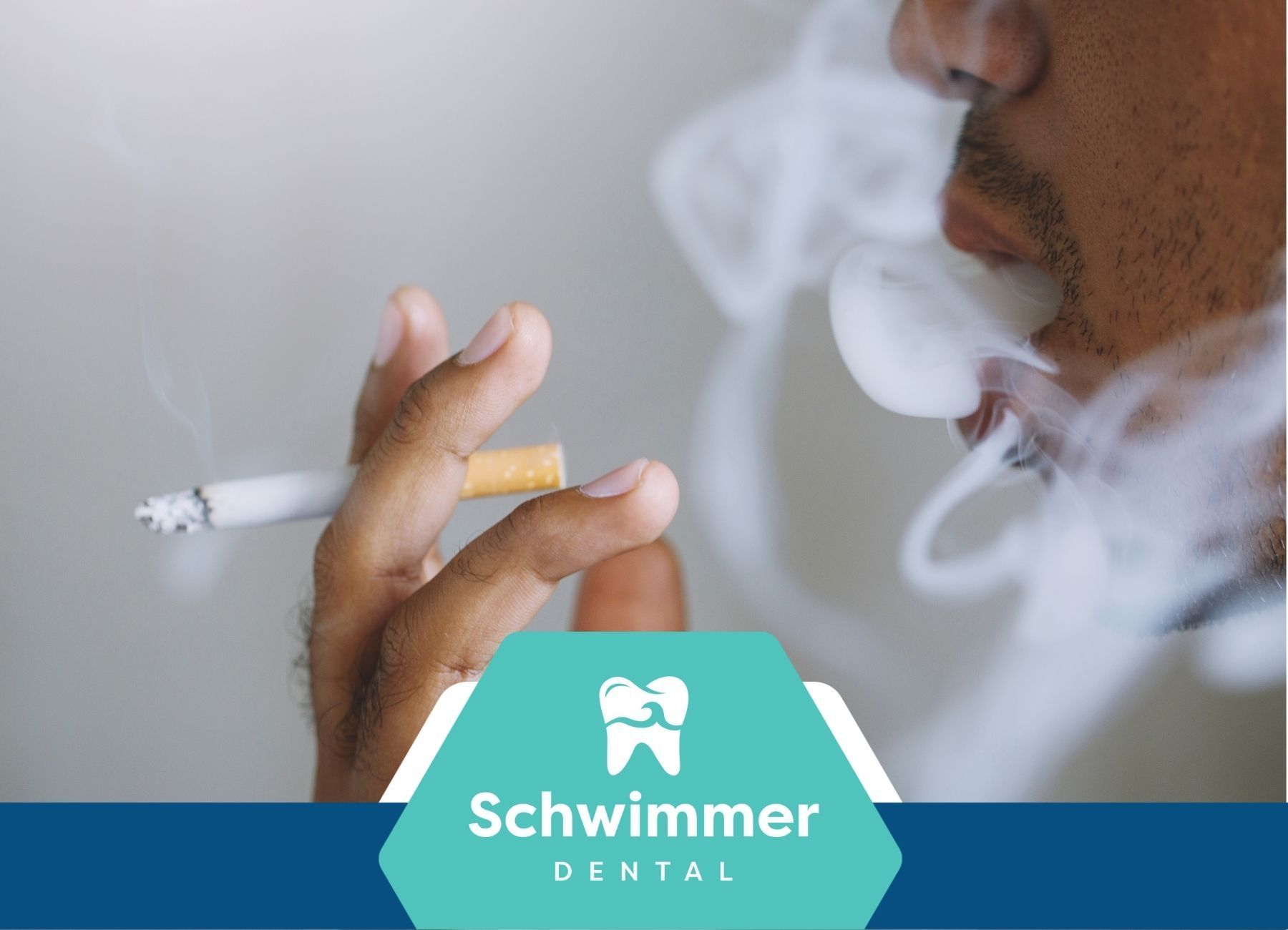 man smoking tobacco