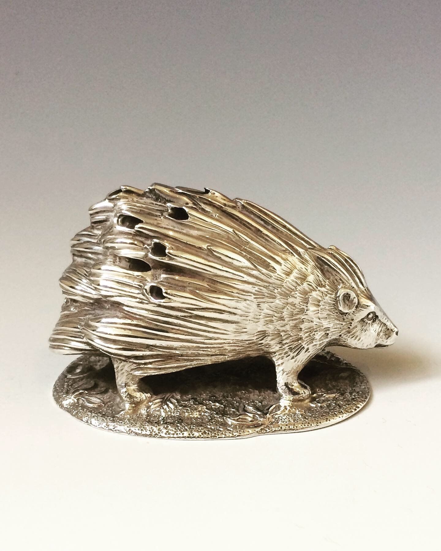 antique silver animal