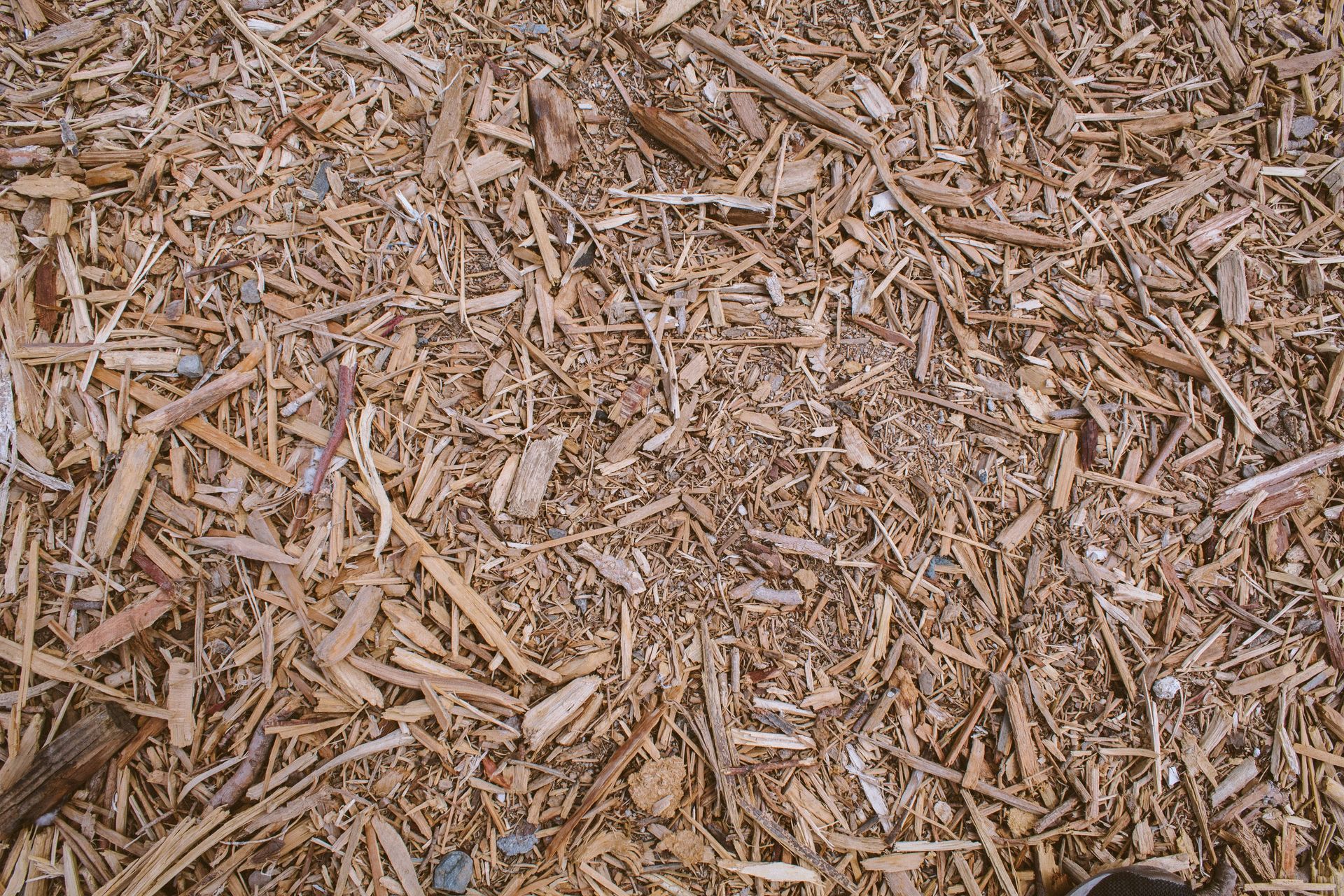 Wood Chips, Brown and Tan, Covering a Surface — Bennett's Tree Service in Redhead, NSW