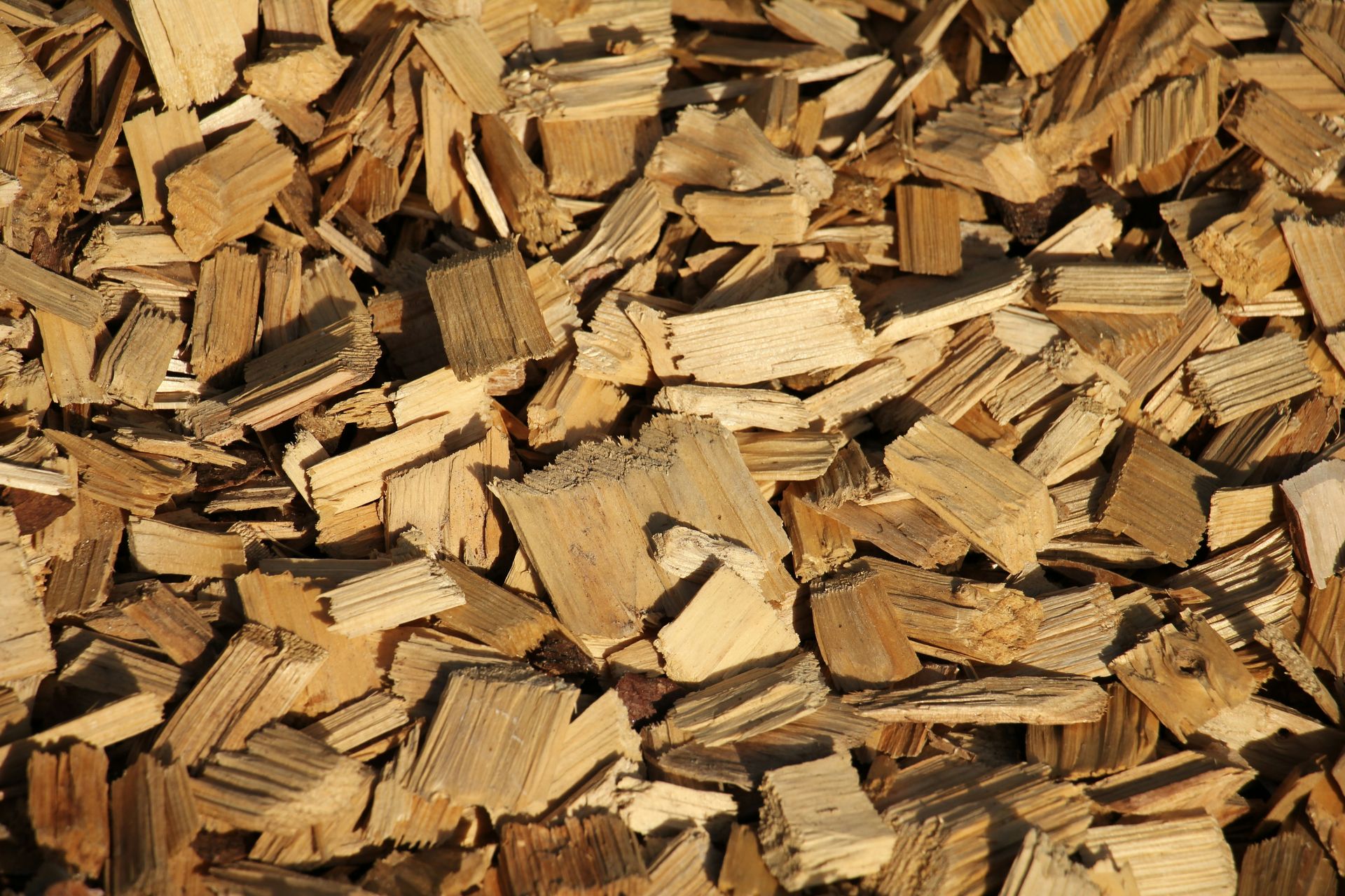Pile of Light Brown Wood Chips — Bennett's Tree Service in Redhead, NSW