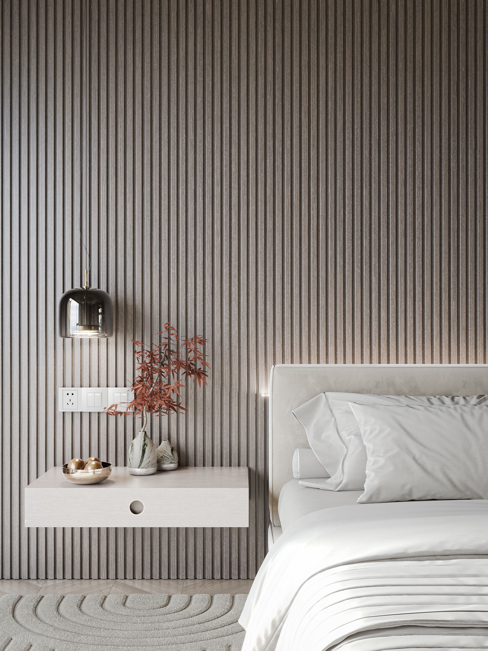 Bedroom with textured gray wall, floating nightstand, and soft white bedding.