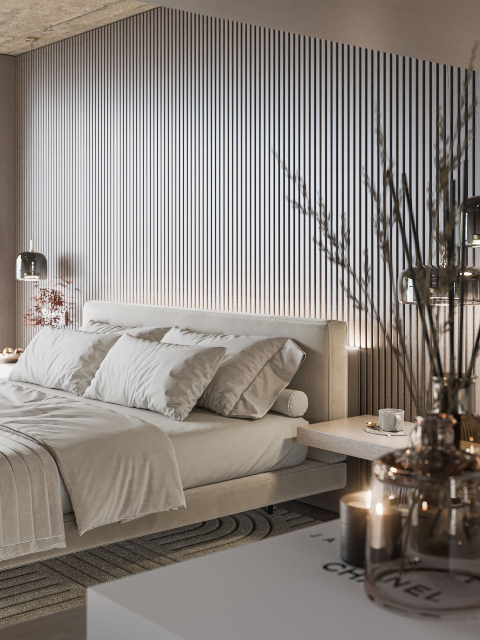 Bedroom with white bedding, ribbed wall, and decorative candles.