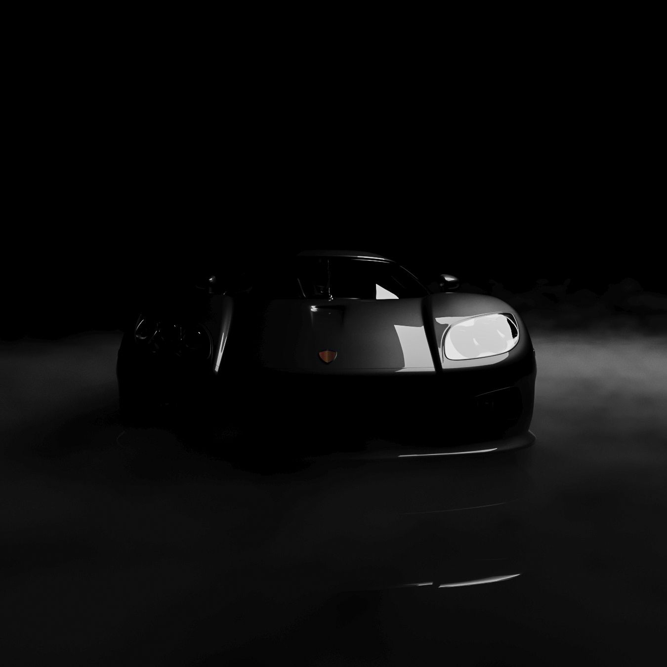 Black sports car in a dark setting, headlights on, surrounded by a hazy fog, reflective surface.