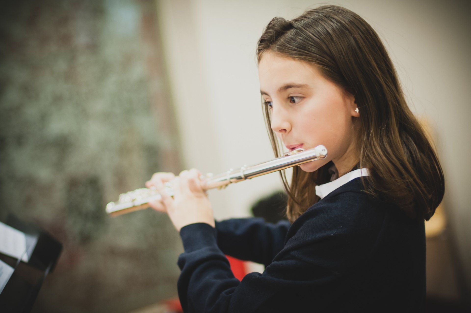Girl Playing Flute — Los Alamitos, CA — Applied Music Studio
