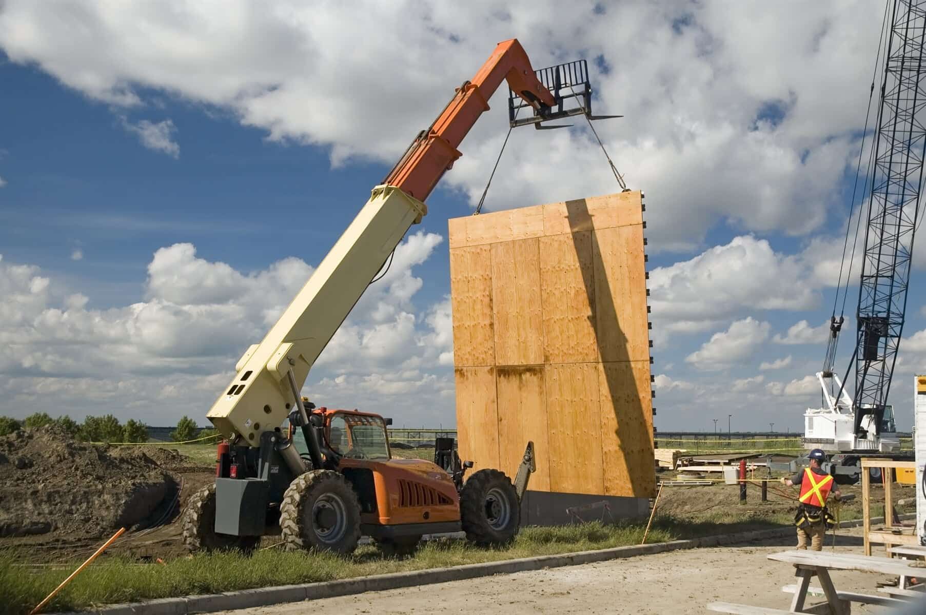Unloading Bales from Truck — Crane Rentals in Taree, NSW