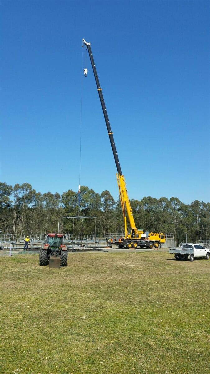 Crane Carrying Scaffoldings — Crane Rentals in Taree, NSW