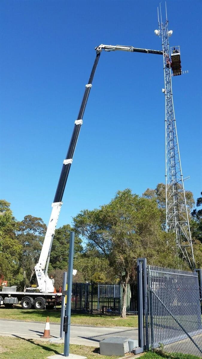 Building a Telecommunication Tower — Crane Rentals in Taree, NSW