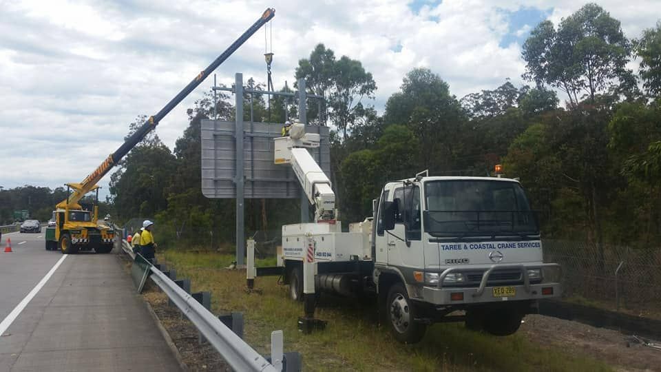Installing Traffic Signage — Crane Rentals in Taree, NSW