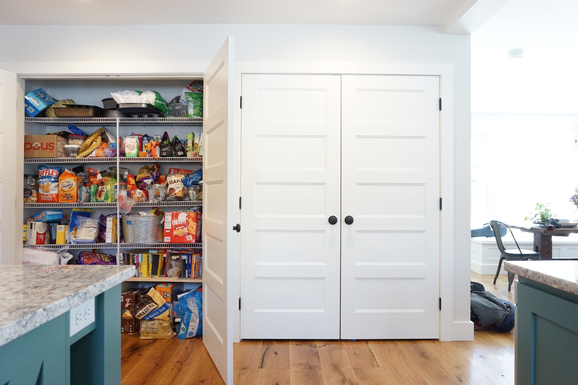 new kitchen design in Long Meadow, MA with open pantry door