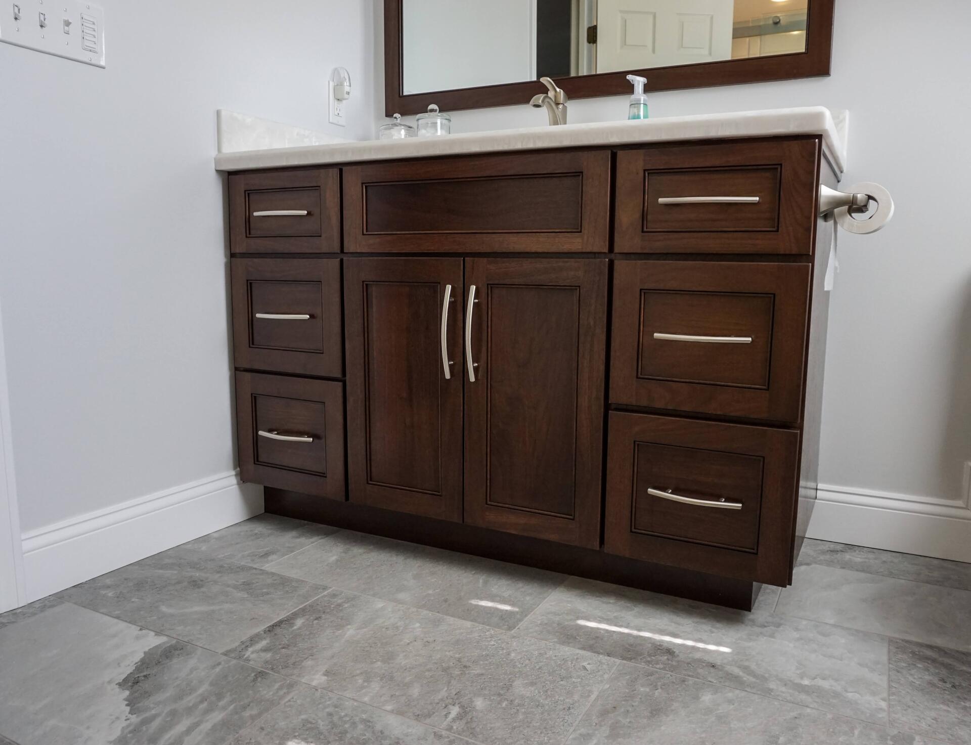 dark stain bathroom vanity in a new bathroom renovation project in Massachusetts