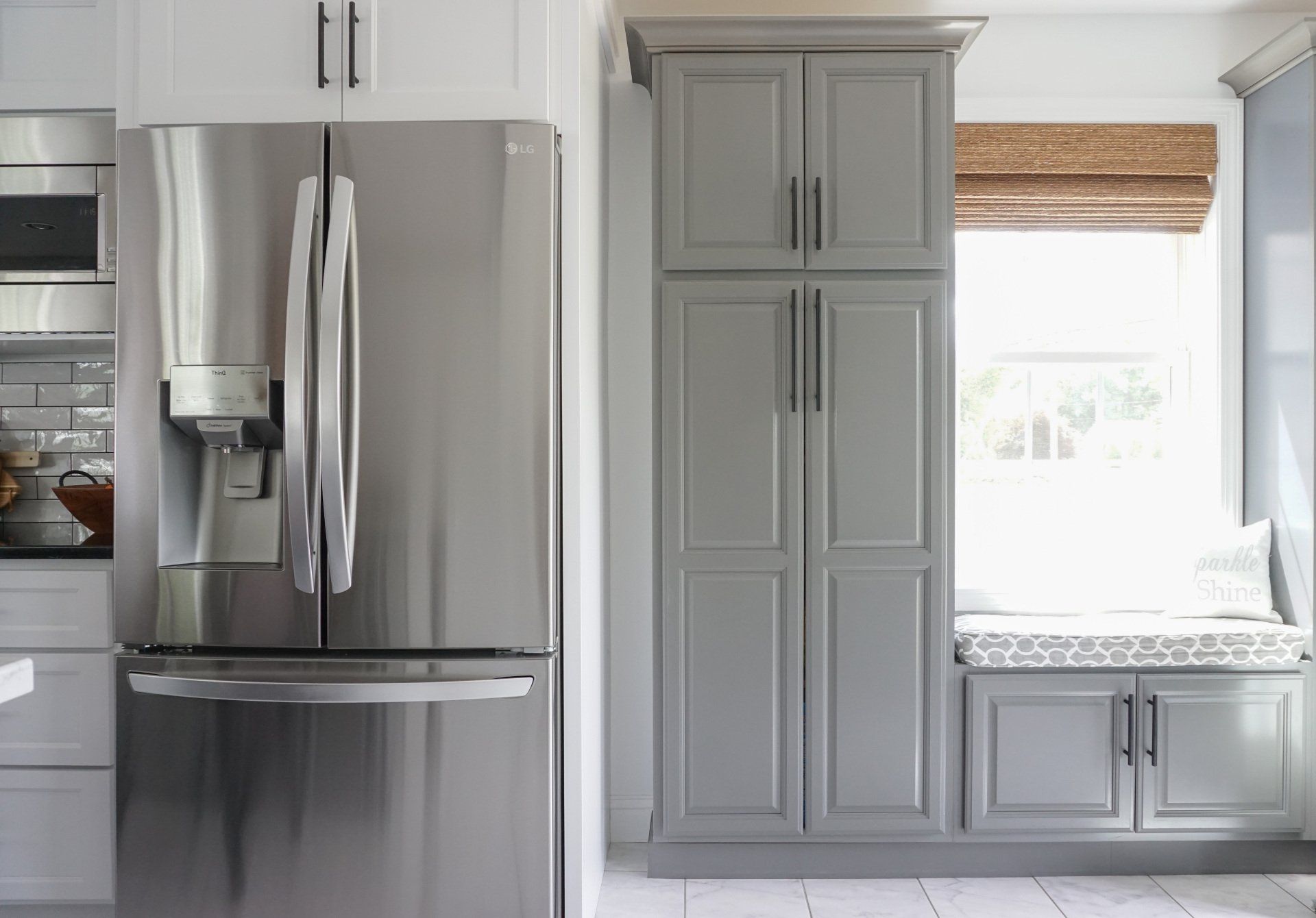 a stainless steel lg refrigerator in a kitchen